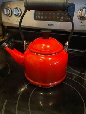 Le Creuset Red Enamel Whistling Kettle with Black Handle and Knob